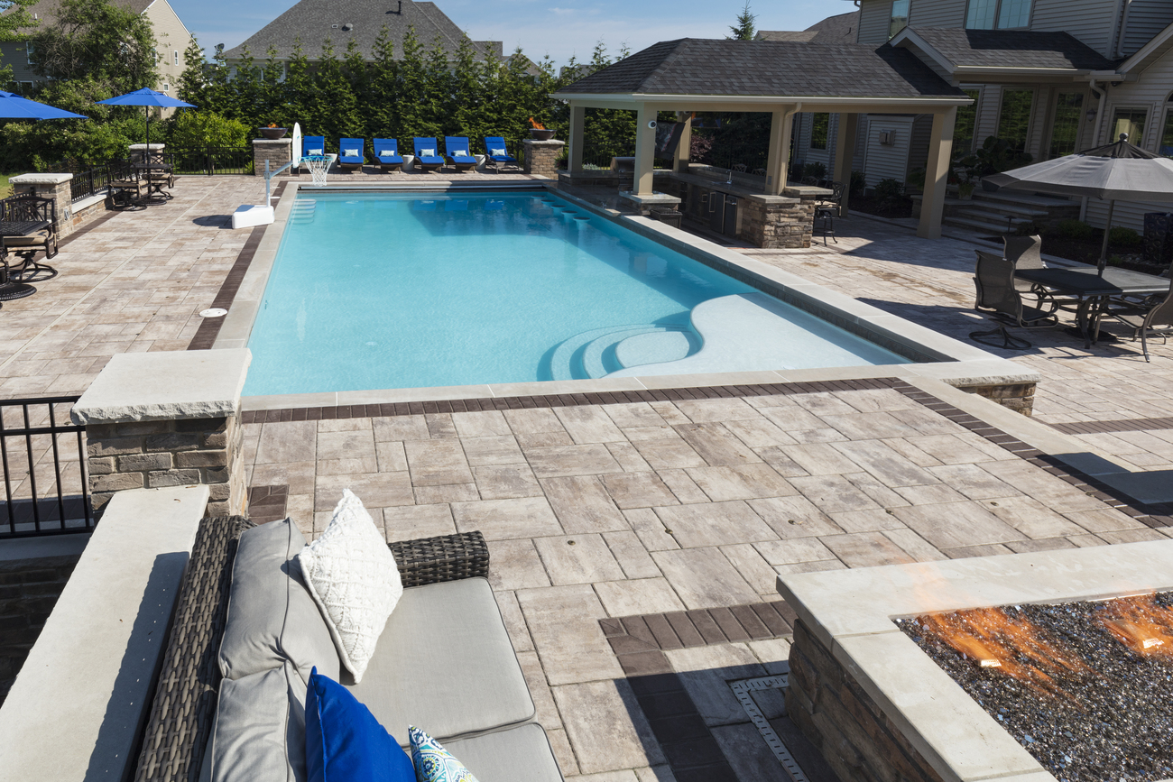 Residential rectangular pool with freeform steps.