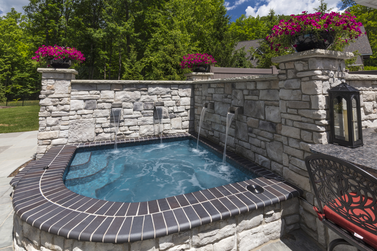 Small water fountain installed in a residential property.
