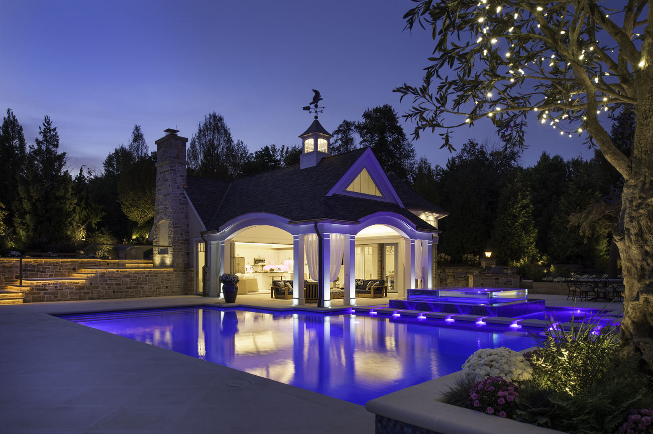 Geometric rectangular pool installed with blue lights.