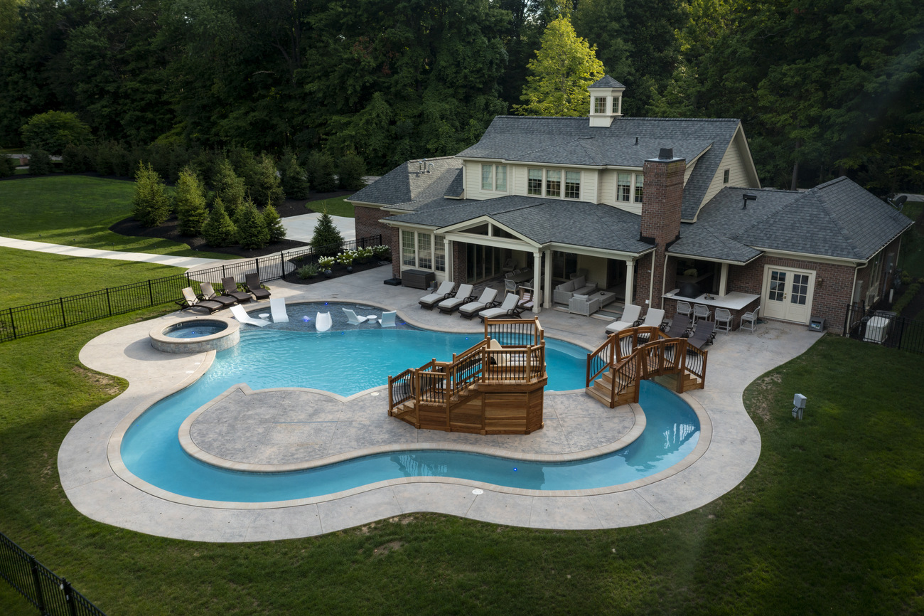 Aerial view of residential freeform pool.