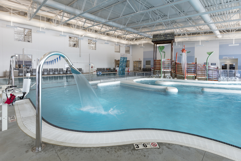 Fountain installed in a large commercial indoor pool.