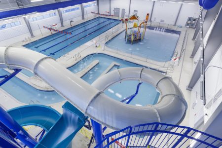 Close up of slides installed in a commercial pool.