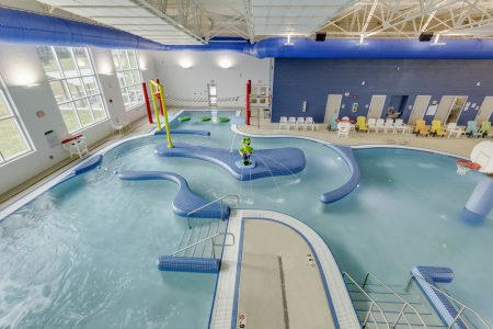 Aerial view of commercial indoor swimming pool in the Ray and Joan Kroc Centre.