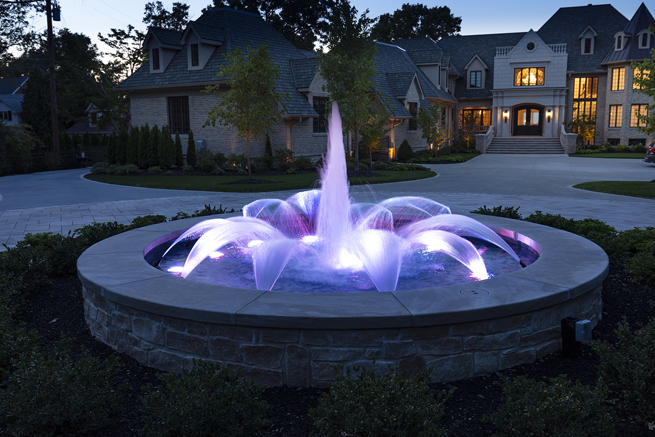 Fountain with blue and purple lights.