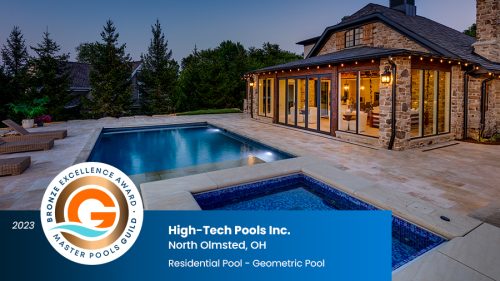 a high-tech pools 2023 gold award from master pools guild for residential geometric pool