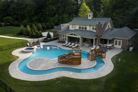 a house with a backyard swimming pool