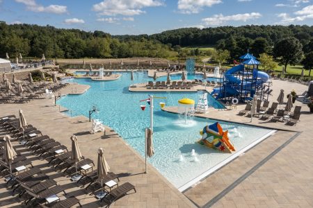 a photo of seven oaks country club showing seating, kids pool and water slides