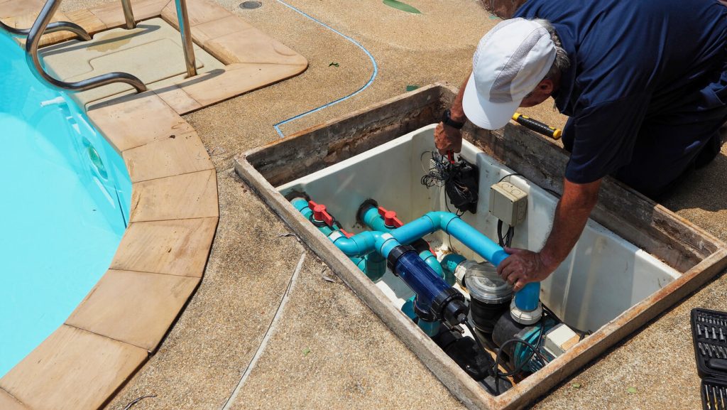 Pool professional from High Tech Pools providing hard water treatment services in Ohio